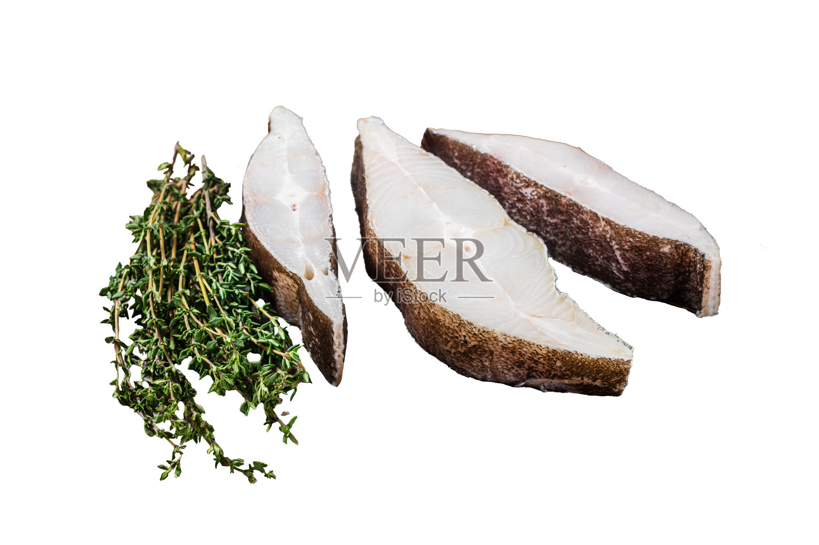 大西洋大比目鱼,加香草的木板生牛排。孤立在白色背景上。照片摄影图片