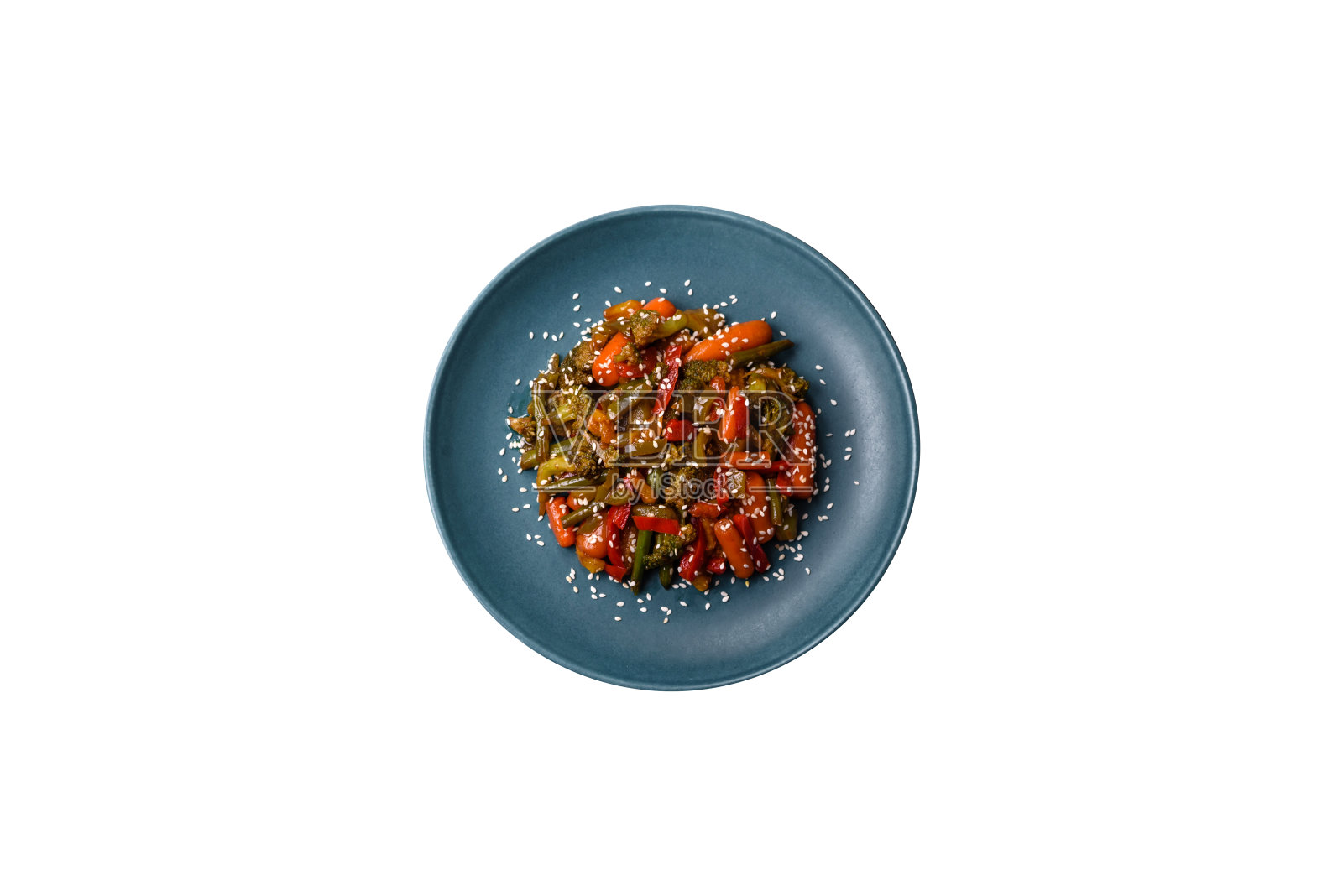 将蔬菜,玉米,胡萝卜,辣椒,西兰花,洋葱混合在照烧酱中照片摄影图片