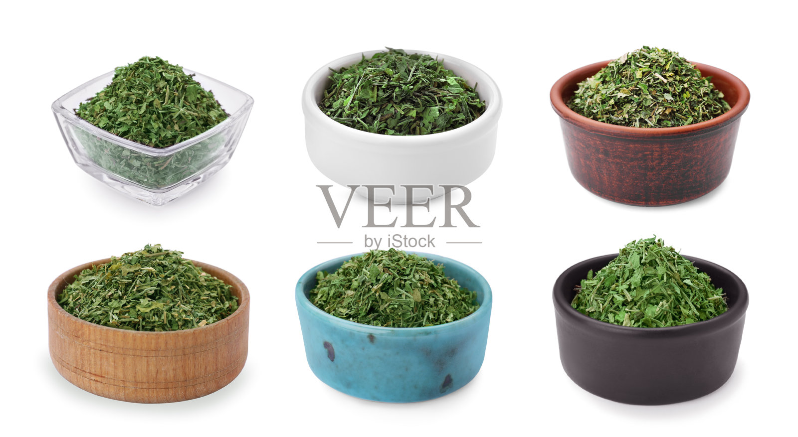 干欧芹在碗中隔离在白色,设置照片摄影图片