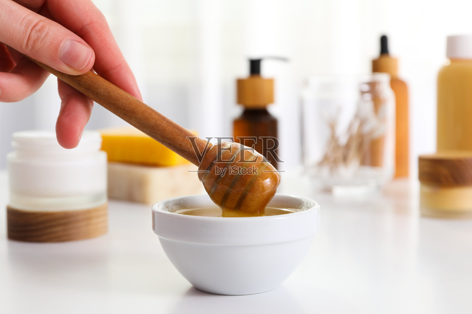 概念面部和皮肤护理用品-蜂蜜化妆品照片摄影图片