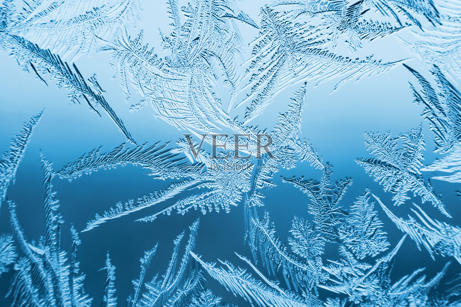 玻璃上抽象的霜纹,背景纹理照片摄影图片