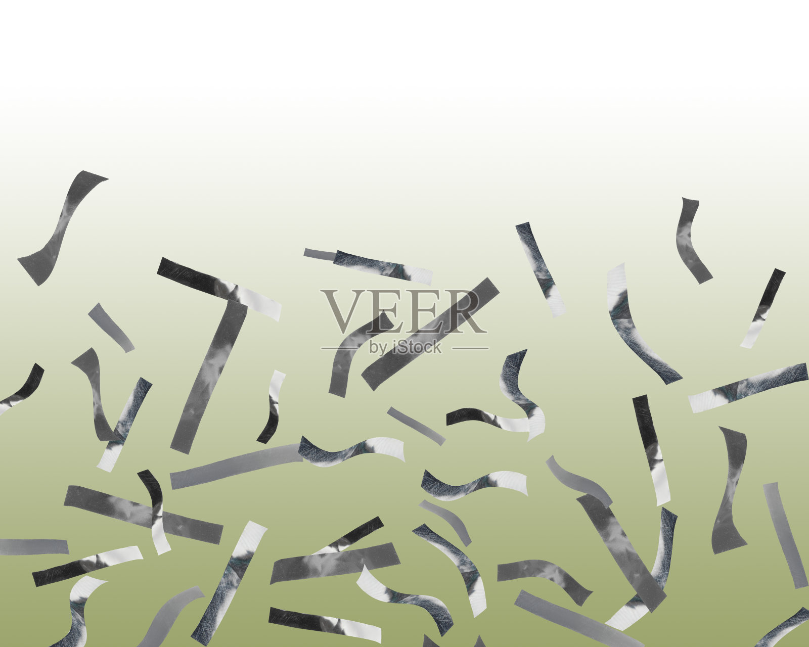 闪亮的银色五彩纸屑落在渐变的绿色背景照片摄影图片