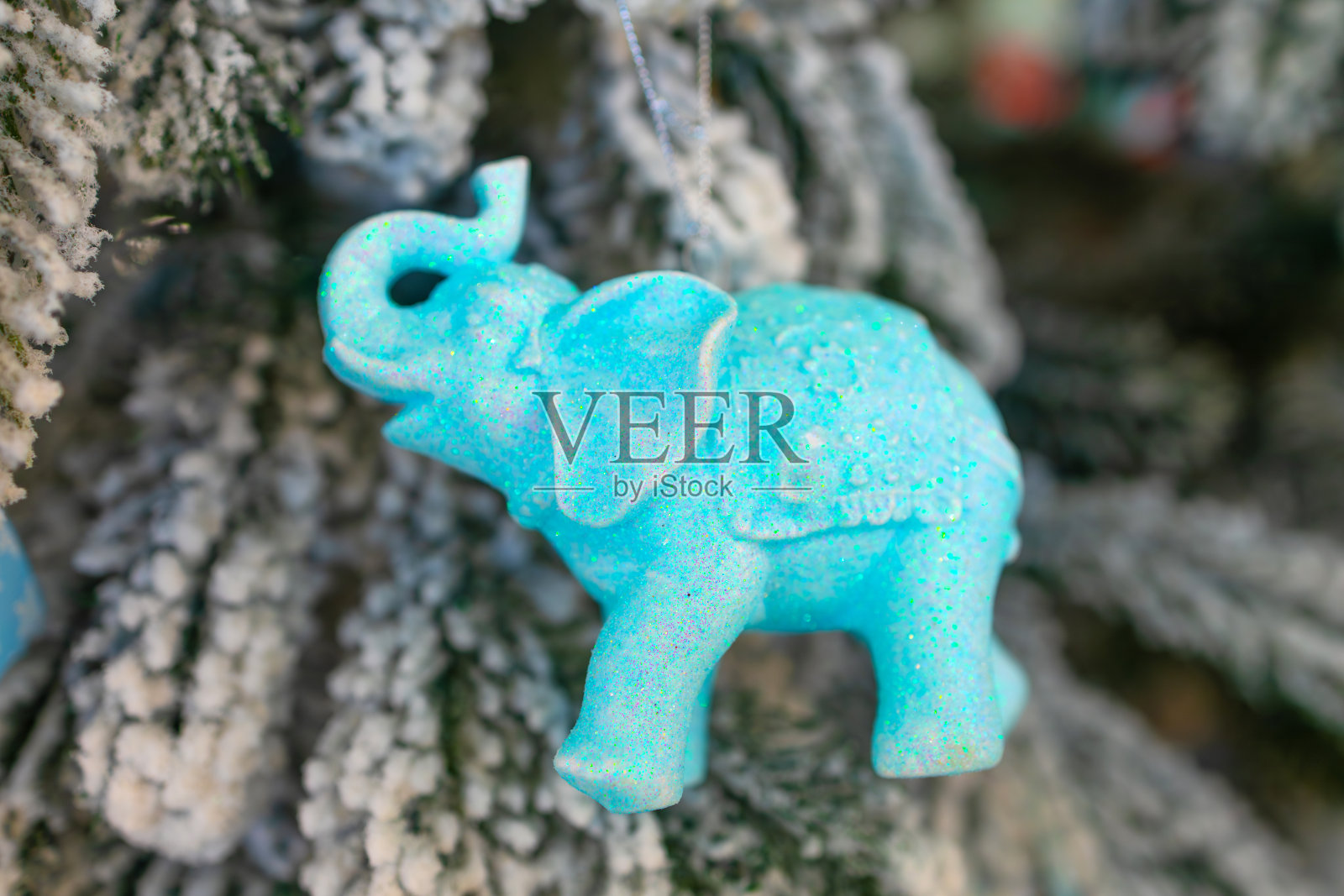 闪闪发光的蓝色大象饰品照片摄影图片