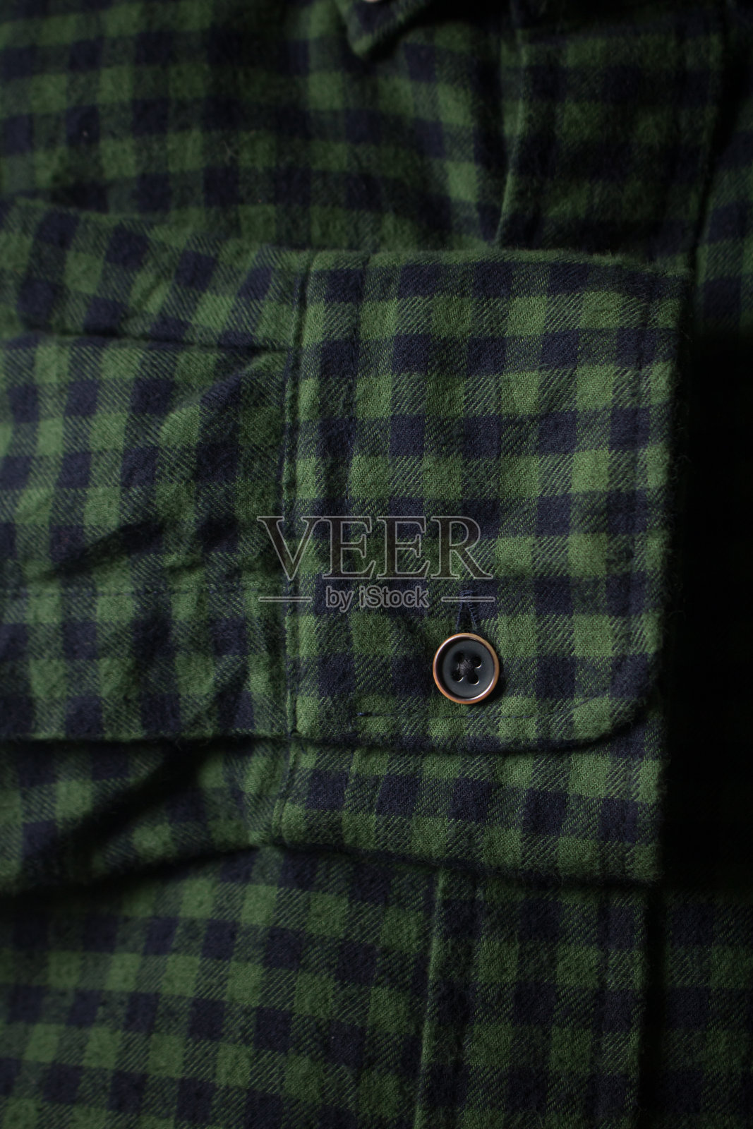 深绿色格子羊毛衬衫的细节照片摄影图片
