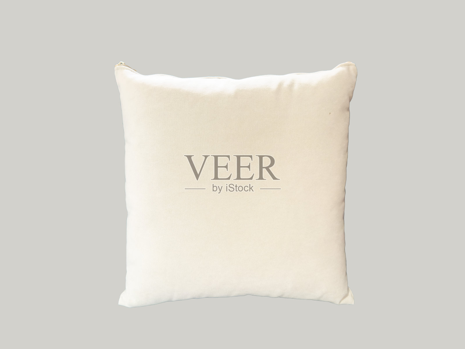 舒适的米色面料靠垫照片摄影图片