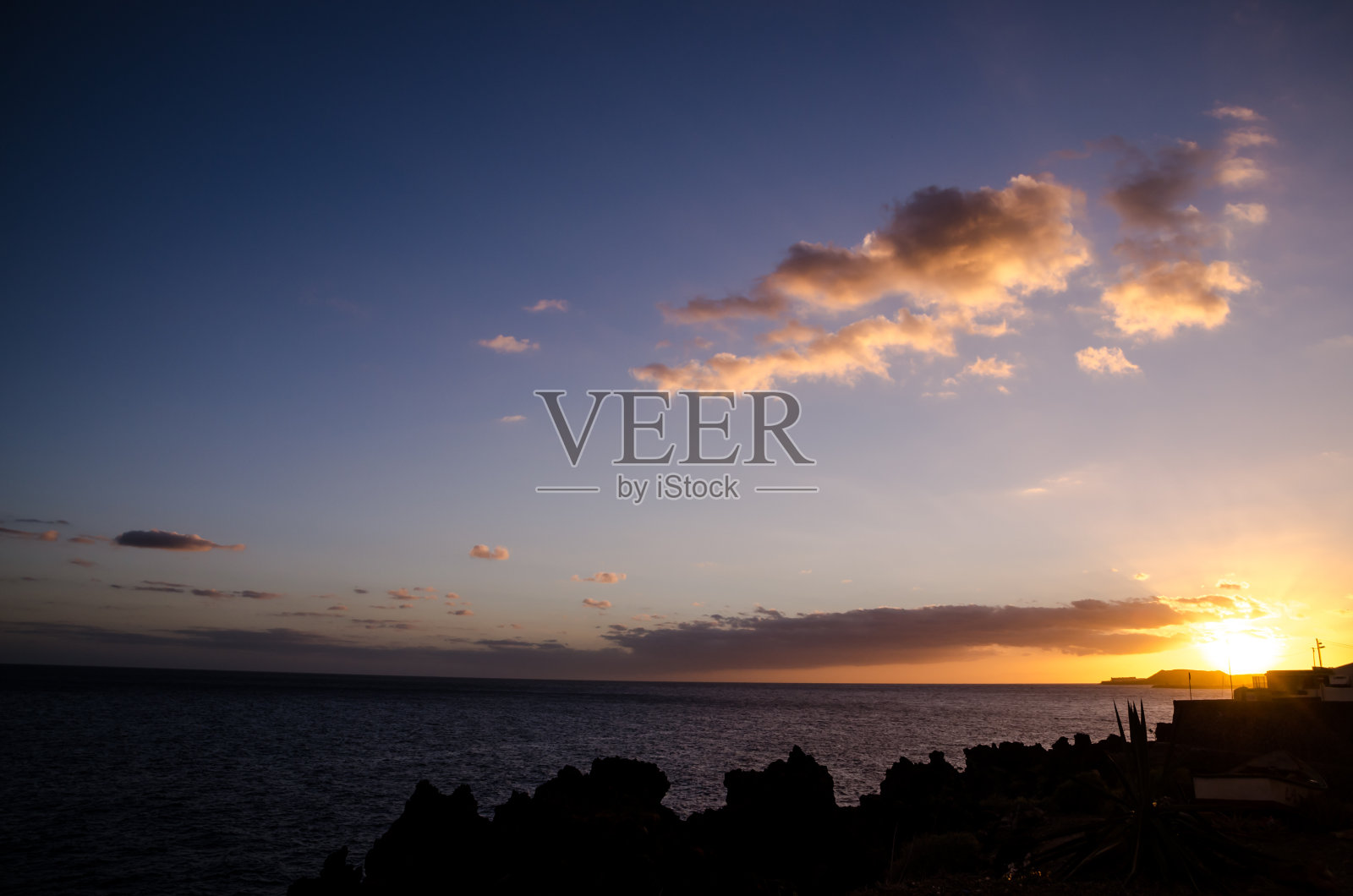 日落时的彩云照片摄影图片