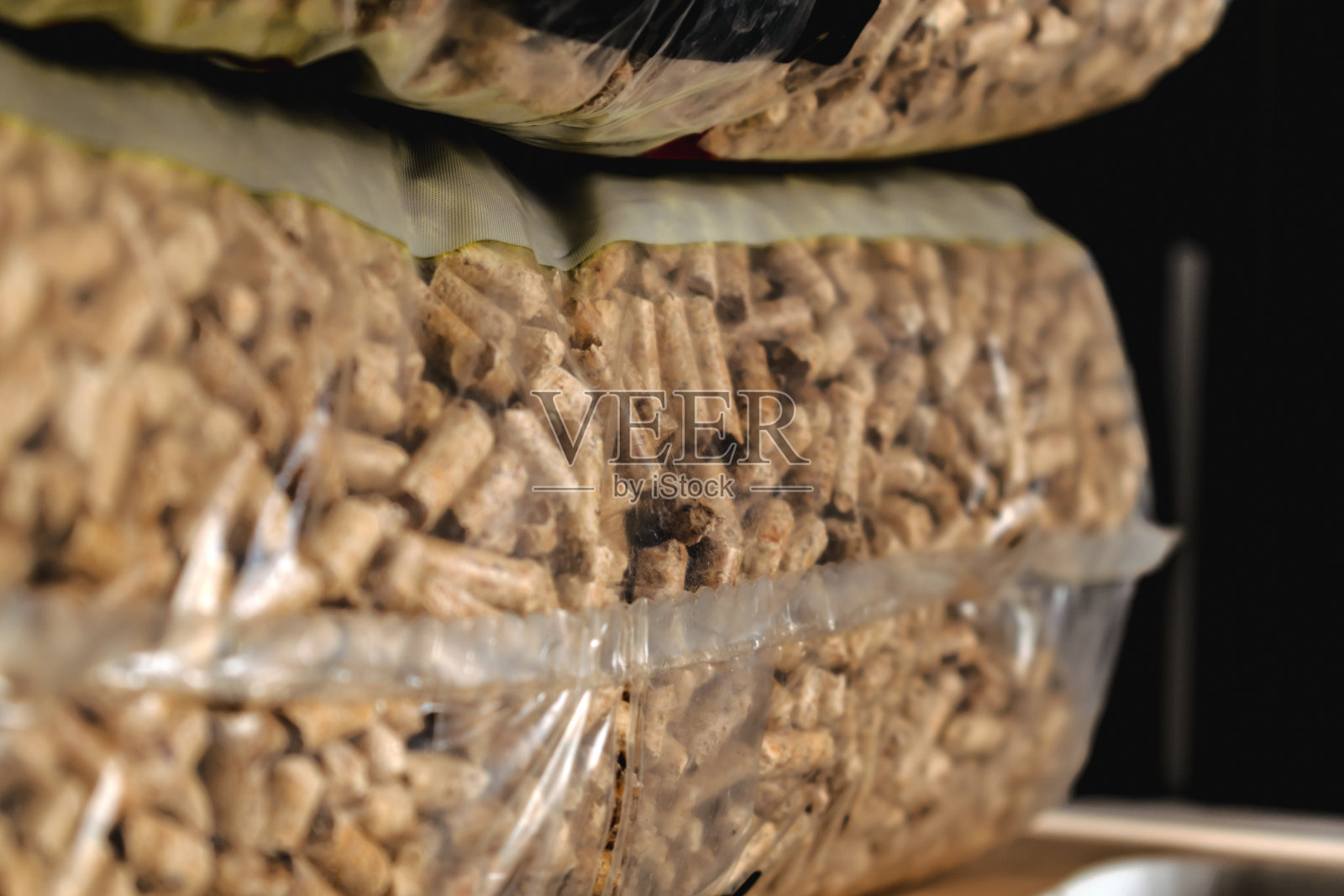 堆积的颗粒袋,可再生能源,压缩木材,替代生活方式照片摄影图片