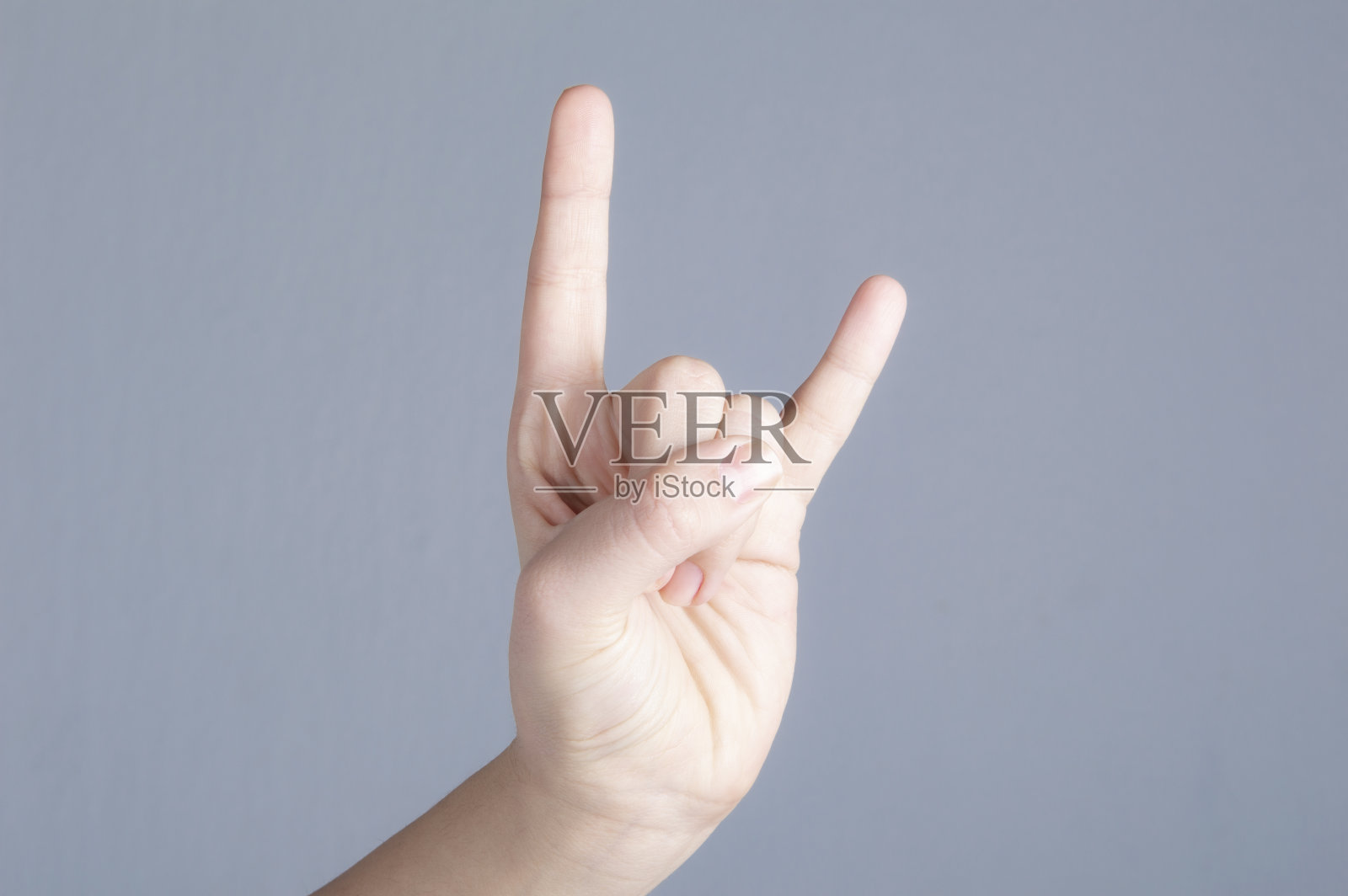 灰色背景上的手势照片摄影图片