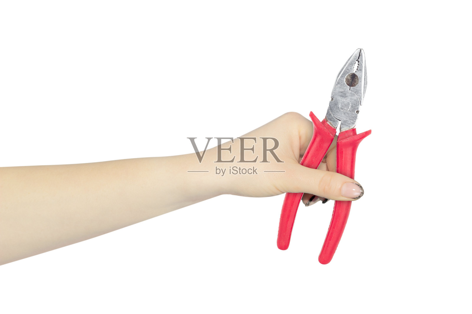 手里拿着钳子,手里拿着钳子工作时带着电,与背景隔绝照片摄影图片