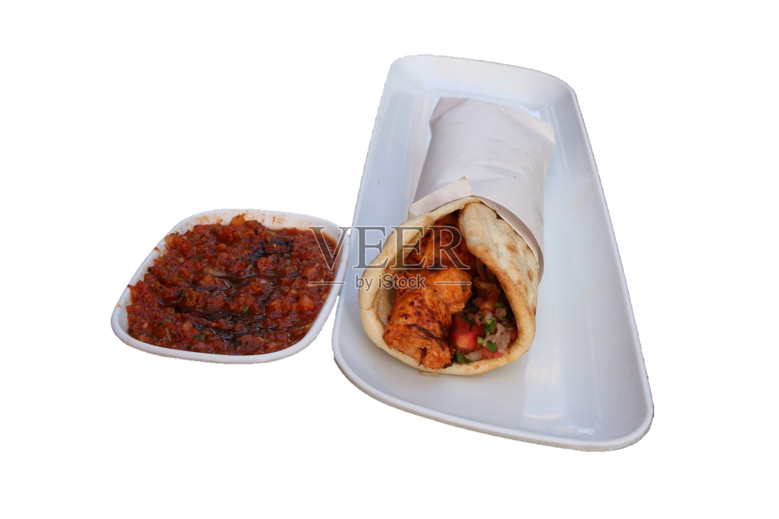 鸡肉串包上辣酱酱照片摄影图片