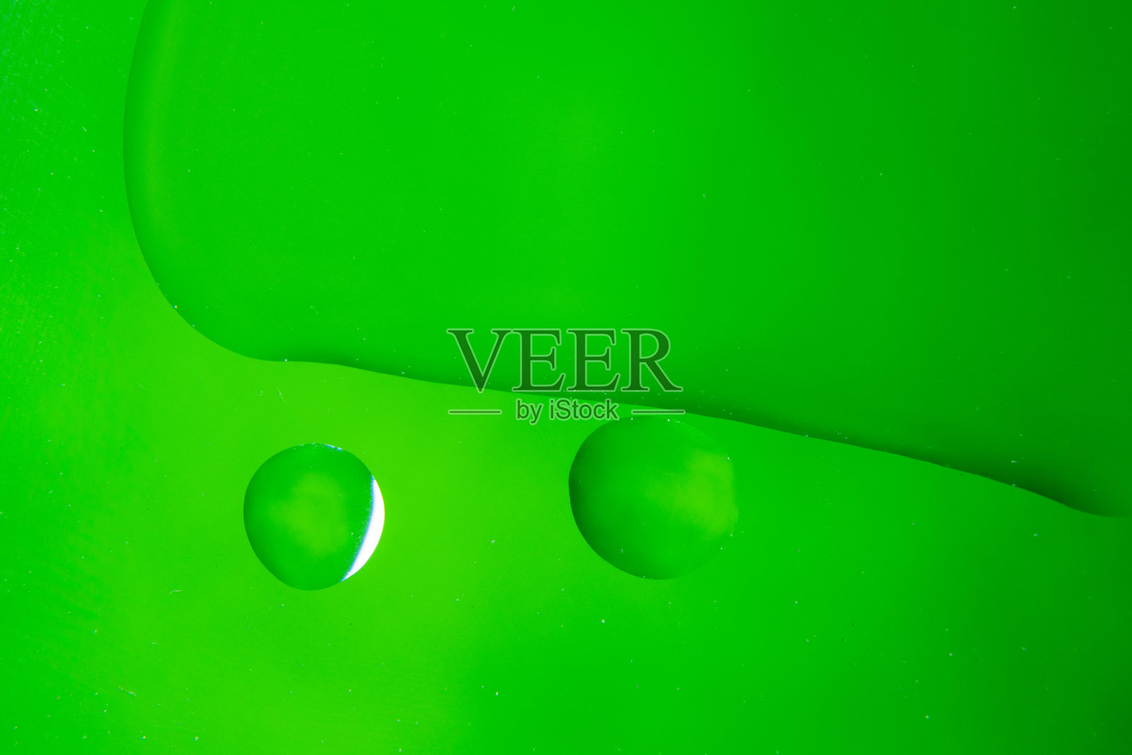 通过混合水和油获得的纹理和背景。然后用微距镜头记录图像。照片摄影图片