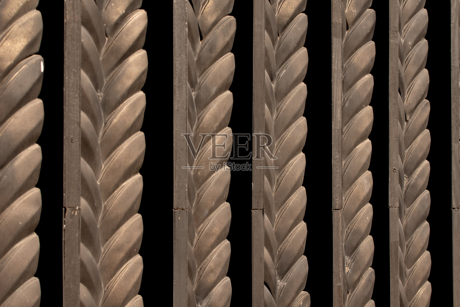 画廊里的青铜艺术图案。照片摄影图片