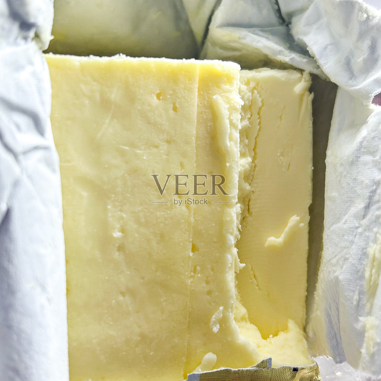 一块包装好的黄油片照片摄影图片