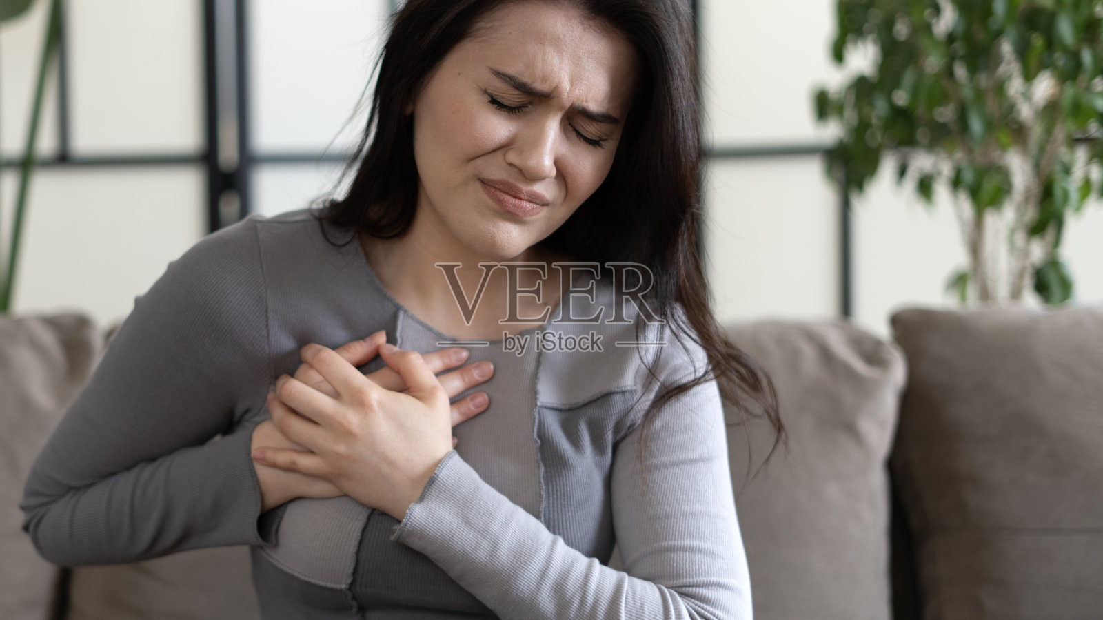 女性有痛苦的压力照片摄影图片