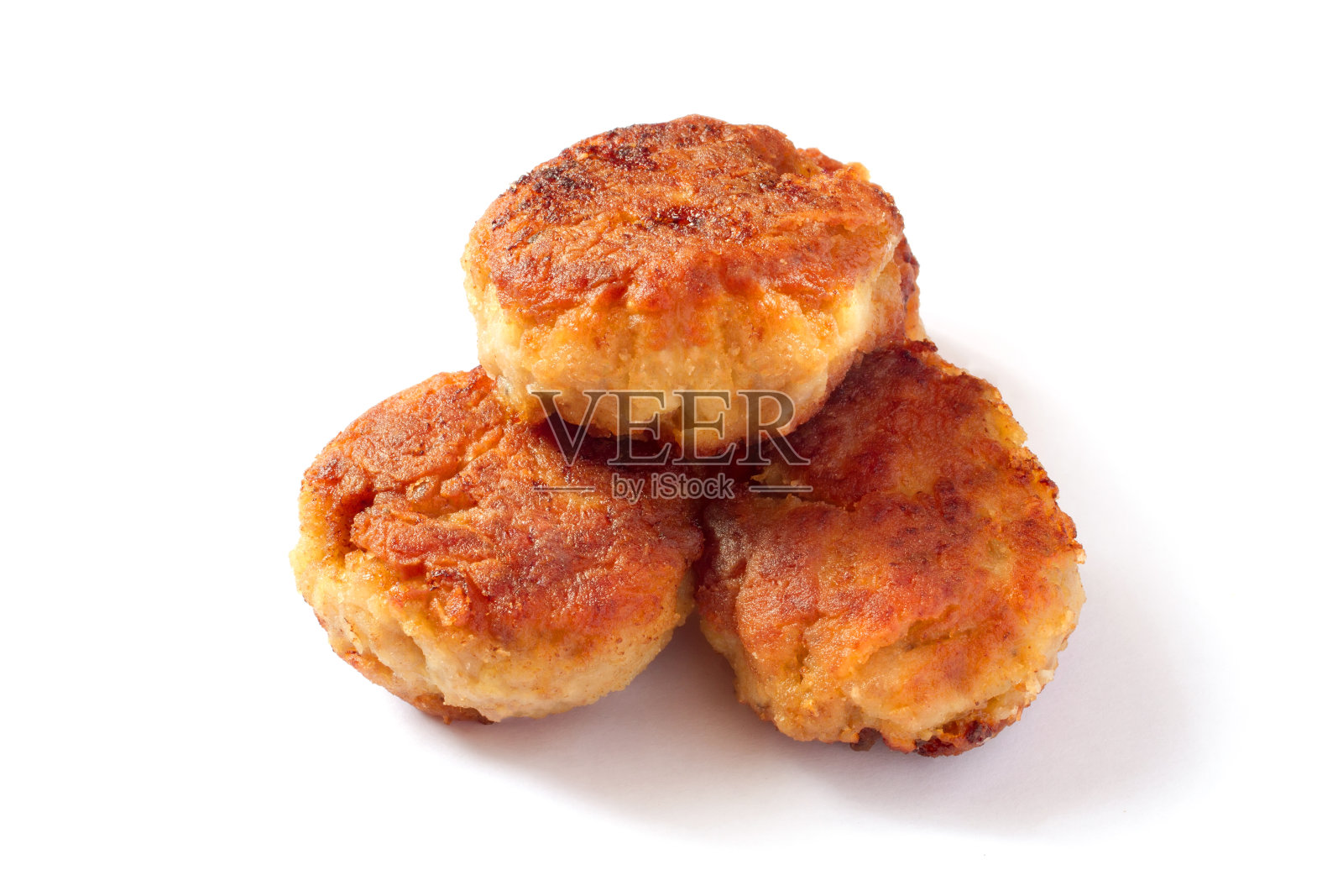 白色背景上的一堆自制肉排。照片摄影图片