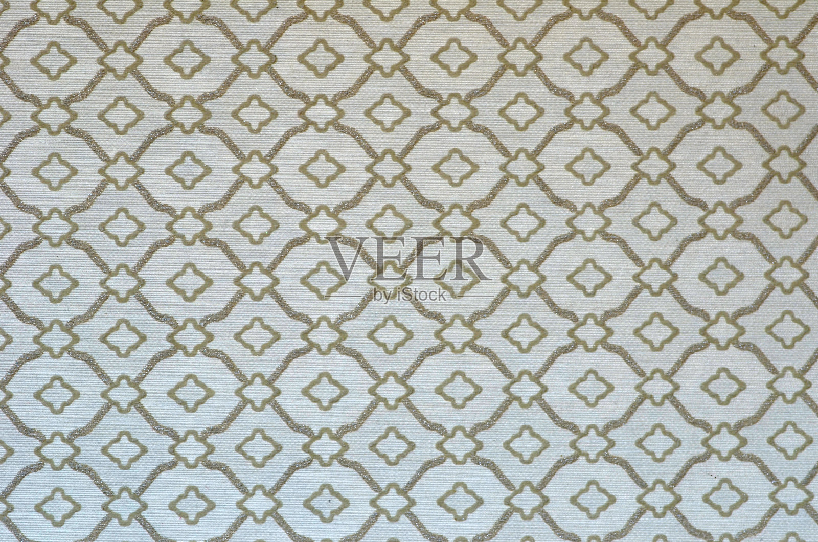 米色房子墙壁上的墙纸有划痕图案。抽象的背景,柔和的奶油色复古地毯,带有柔软的褶皱图案。照片摄影图片