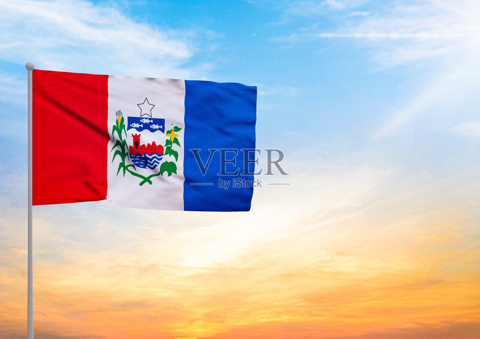 在旗杆上延伸的阿拉戈斯旗帜的3D插图,背景是美丽的天空与日落照片摄影图片