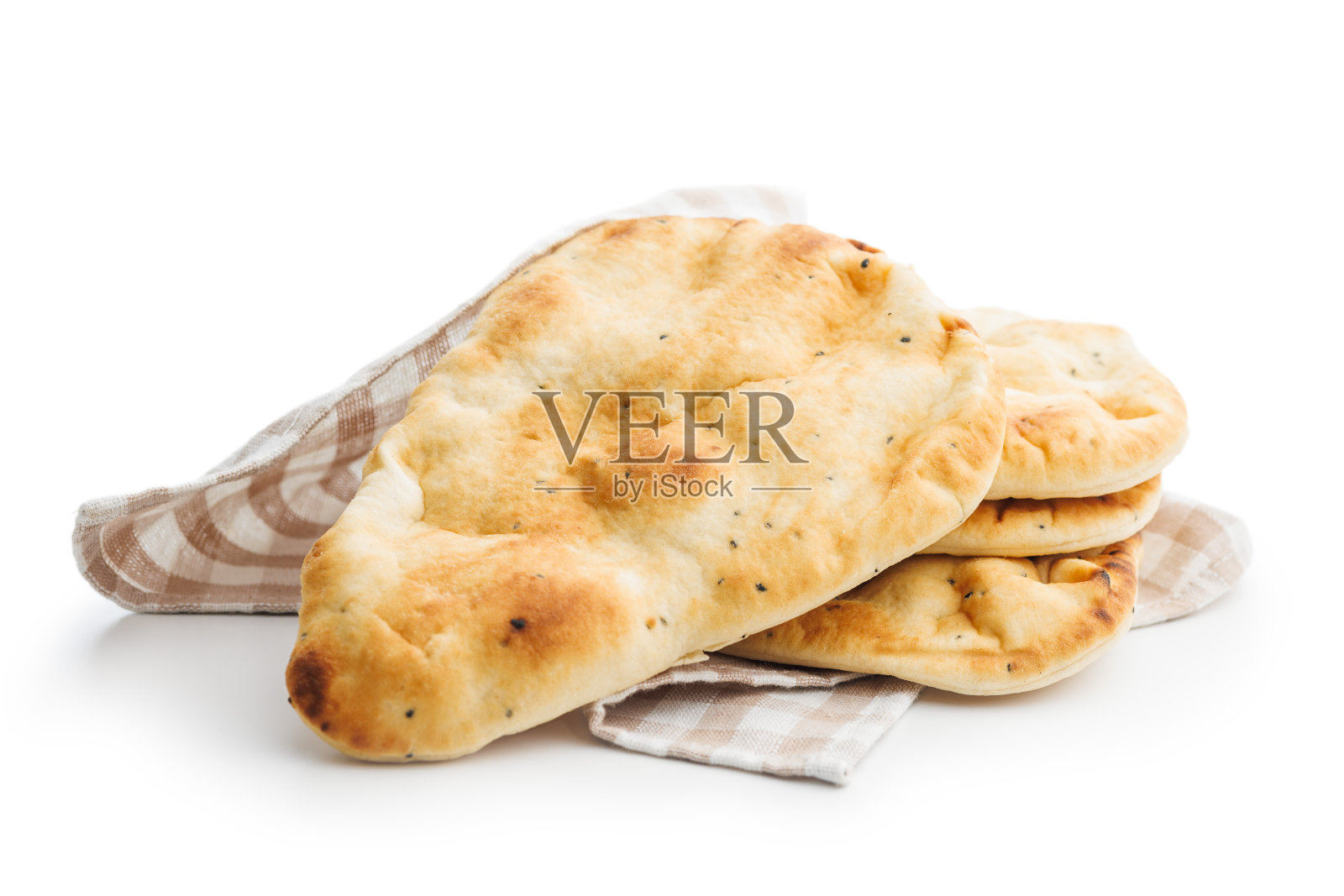 新鲜出炉的馕饼被隔离在白色背景上。照片摄影图片