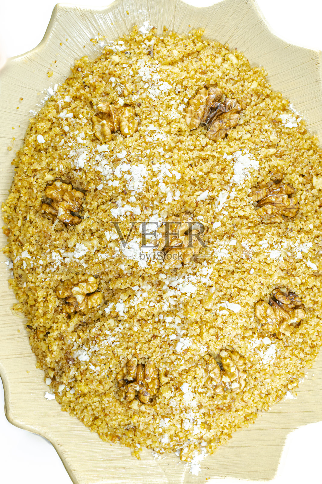 Rfiss,阿尔及利亚传统的小麦粉甜点,正上方。照片摄影图片