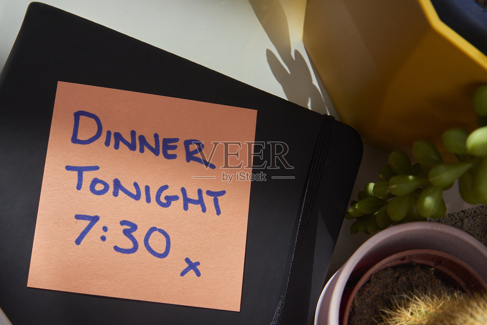 便签上的晚餐约会提醒照片摄影图片