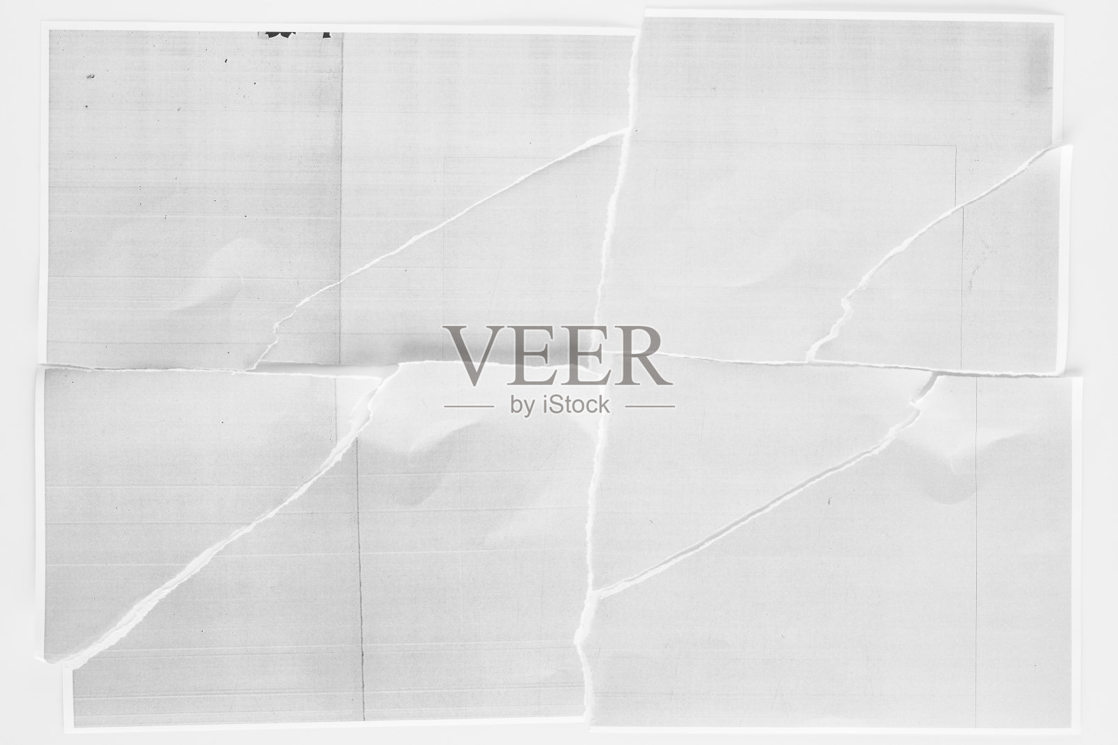 在普通背景上排列的撕破的复印纸照片摄影图片