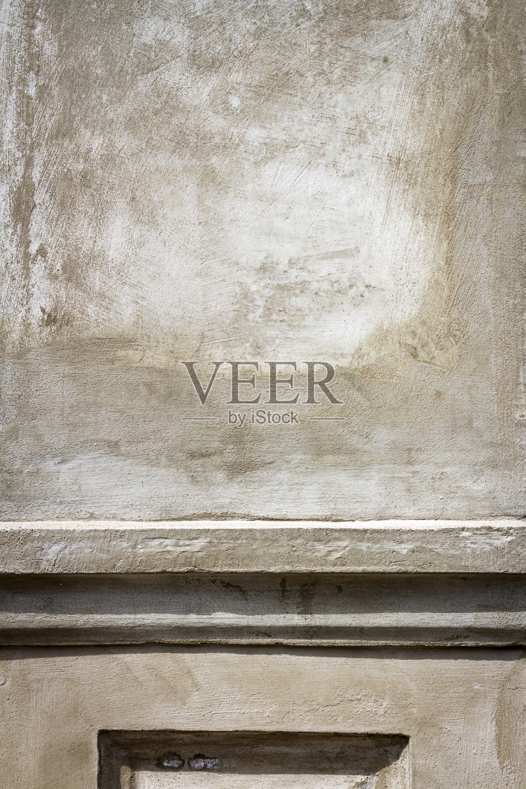 装饰石膏。墙面灰泥纹理。照片摄影图片