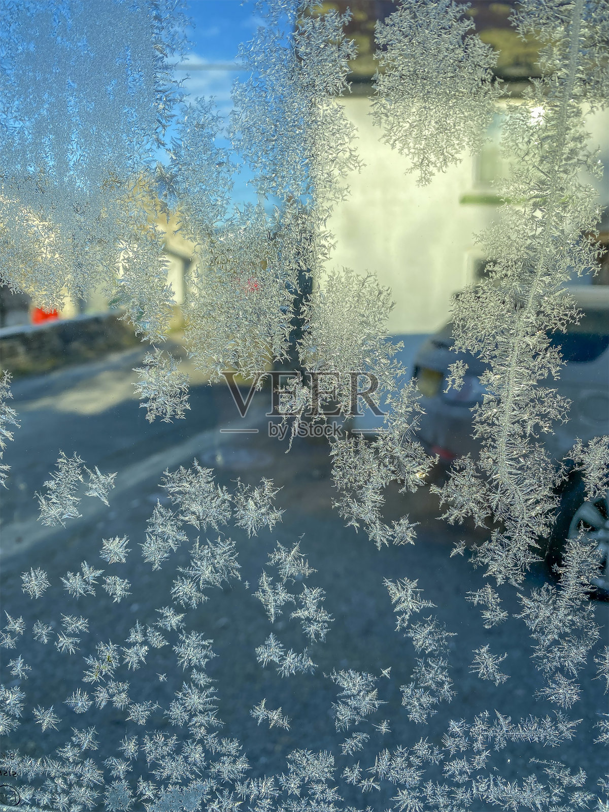 冰雪仙境:霜冻车窗的特写照片摄影图片