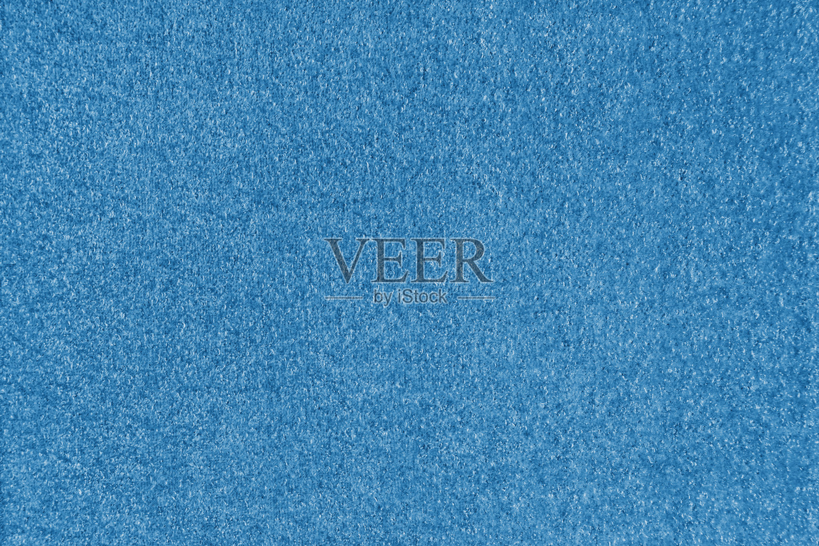 蓝色面料的纹理背景。室内装饰提花肌理布、包圈纺织材料照片摄影图片