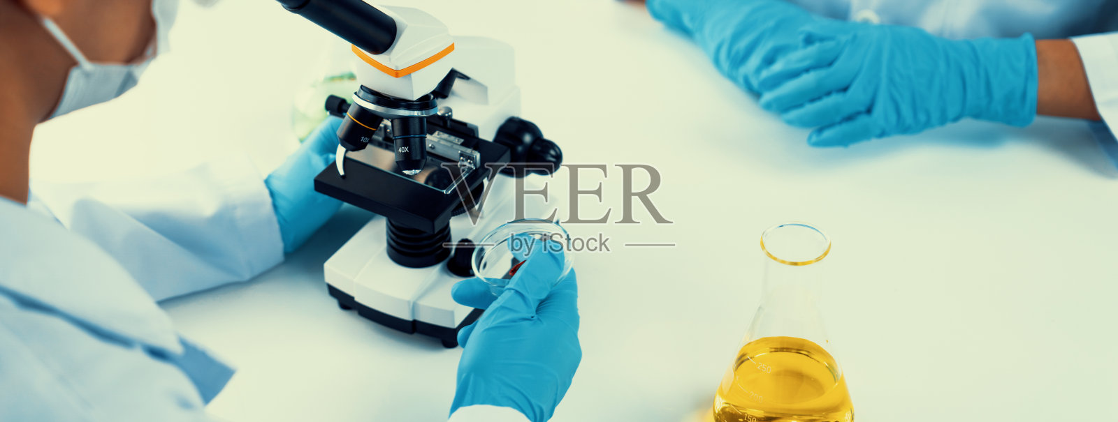 实验室研究人员团队以科学的专业知识推进医疗保健。刚性照片摄影图片