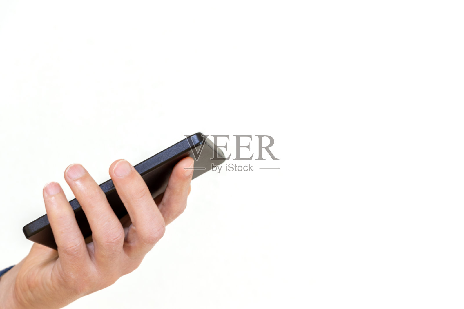 一个人拿着智能手机照片摄影图片