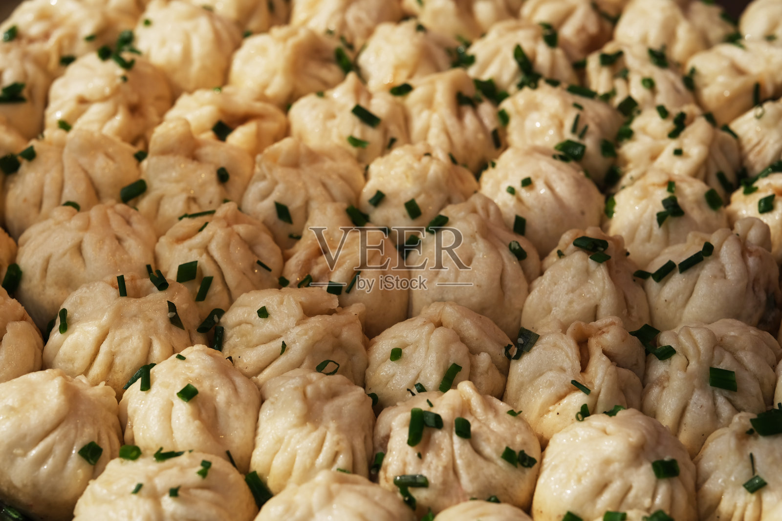 许多中国生煎包(煎包子),中国包子背景照片摄影图片