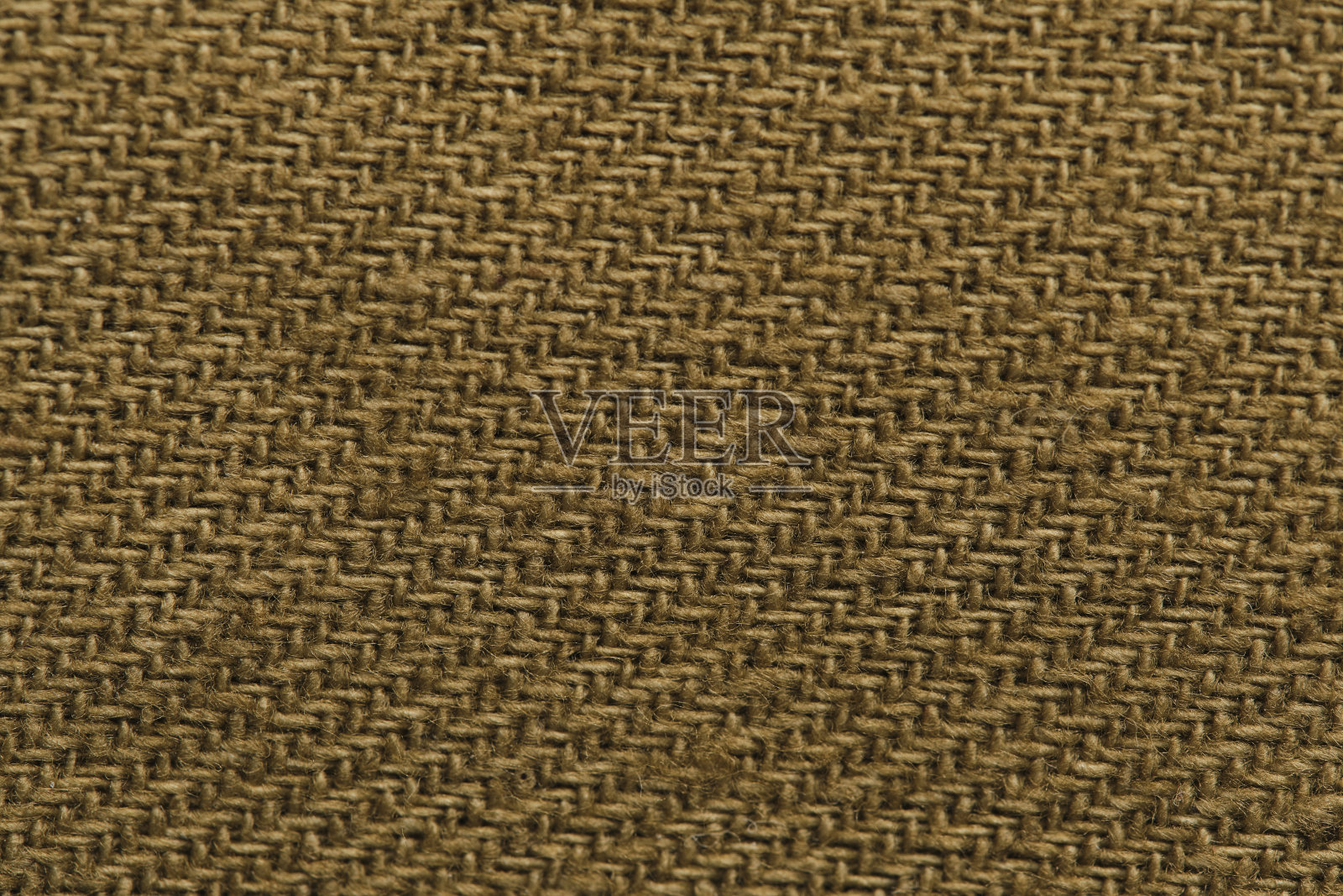 纹理棕色织物特写在微距照片。照片摄影图片