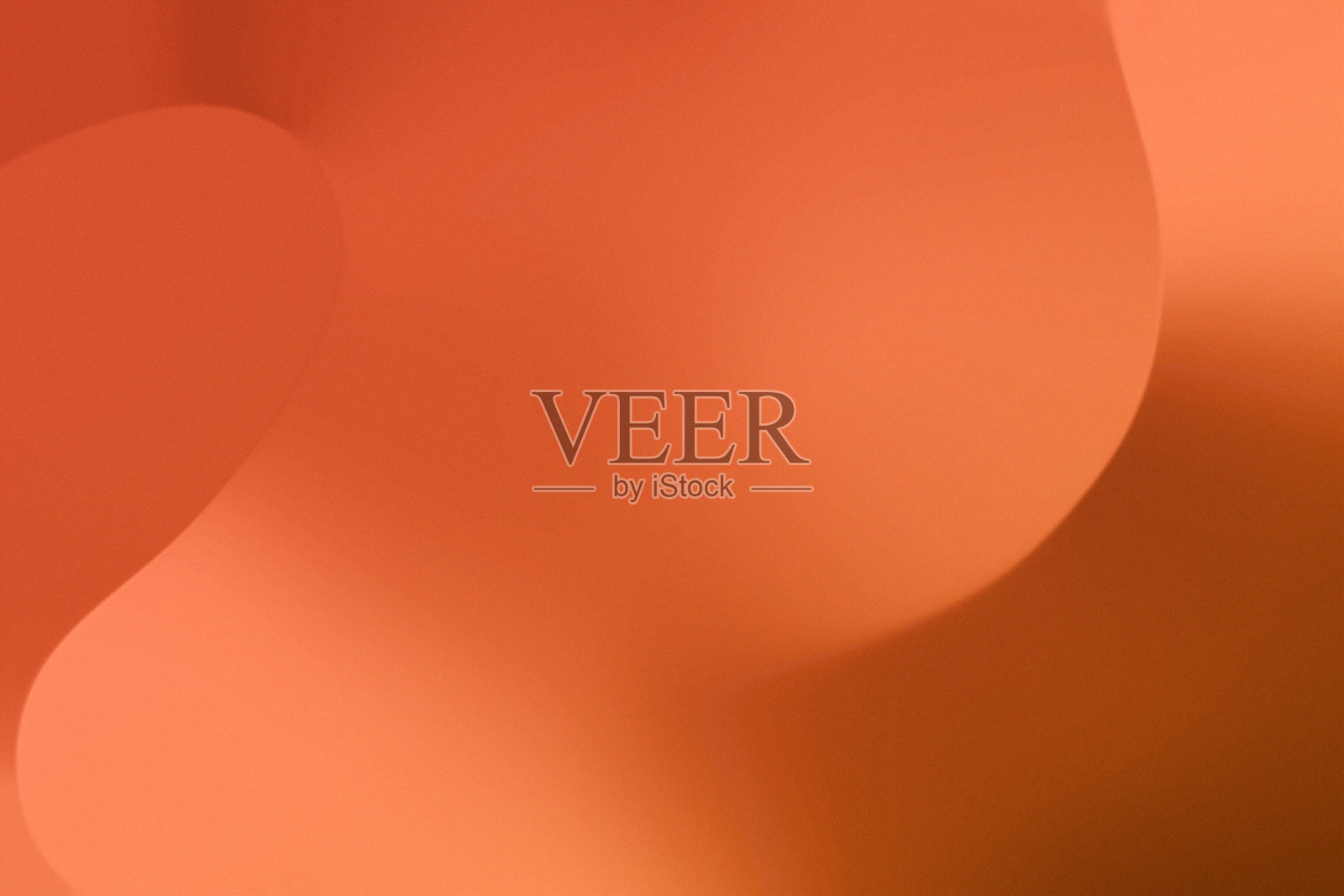 在潮流波流体纹理背景上的浅梯度棕色橙色。照片摄影图片