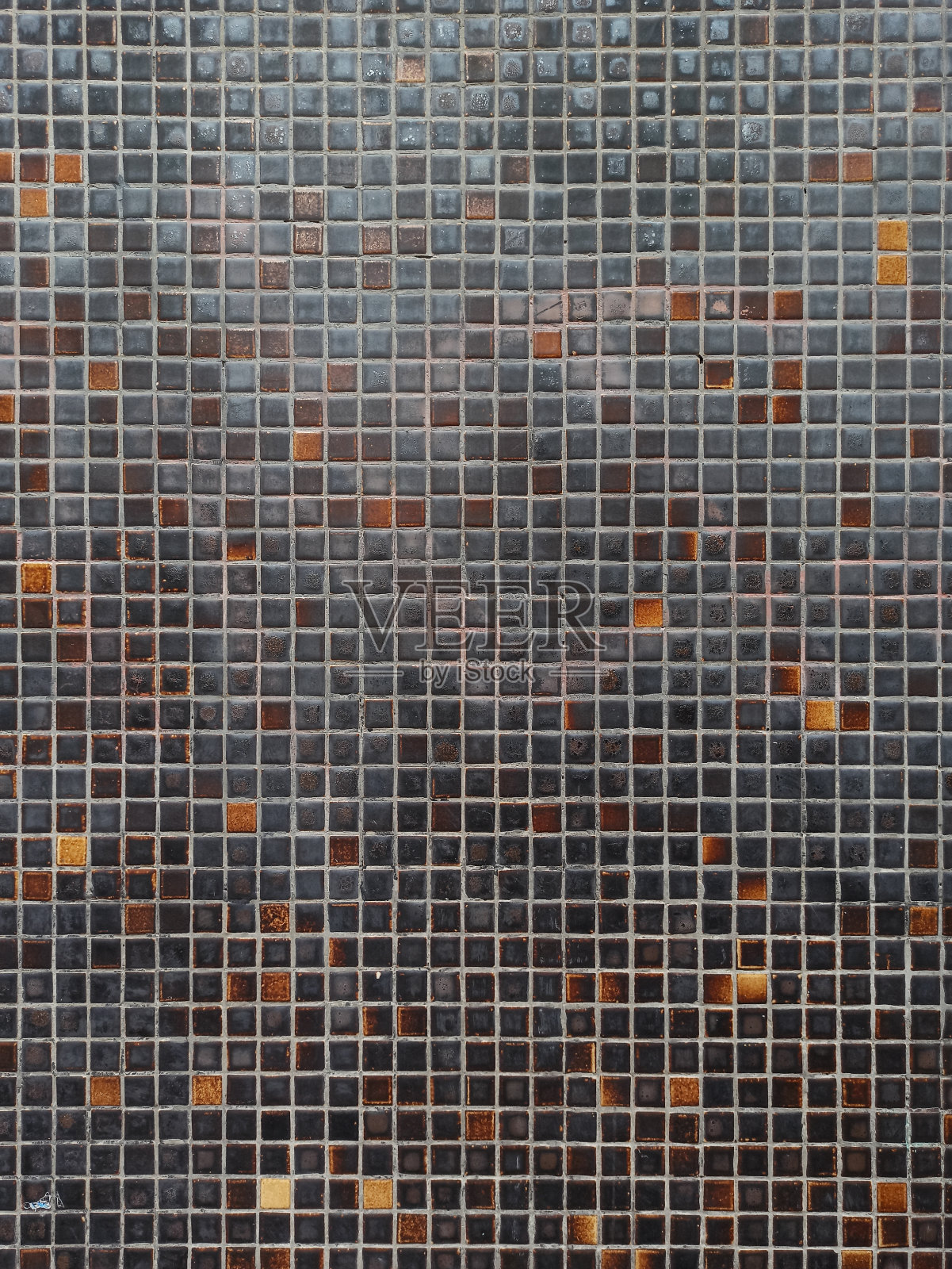 旧的棕色、黑色和橙色墙砖的纹理照片摄影图片