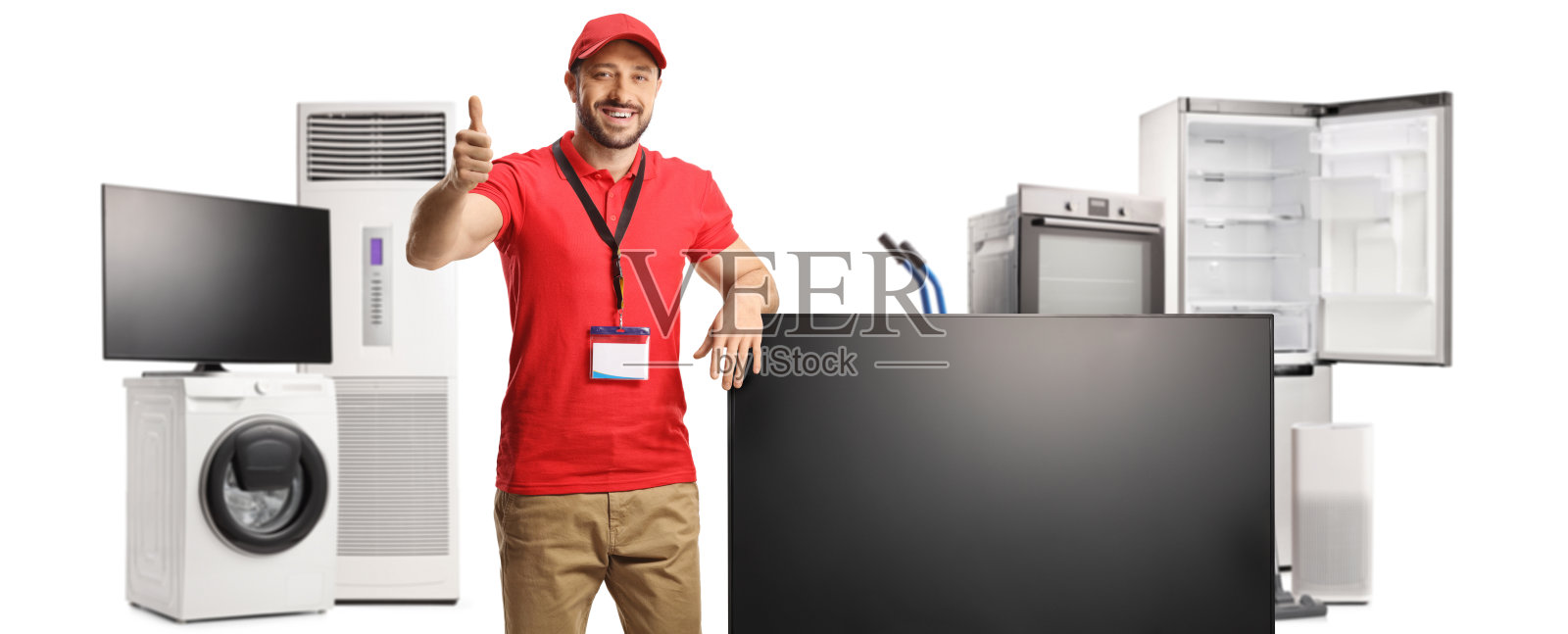 推销员用平板液晶电视屏幕和其他家用电器竖起大拇指照片摄影图片