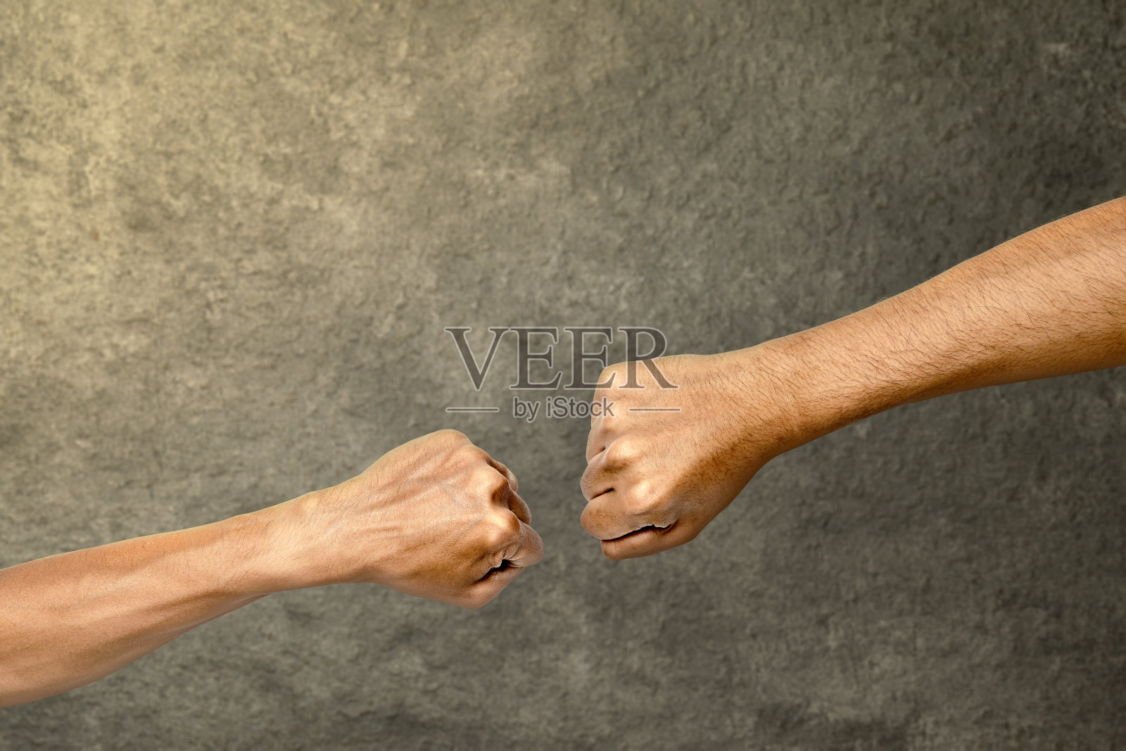 为团结和团队合作,一只手握拳打招呼的特写照片摄影图片