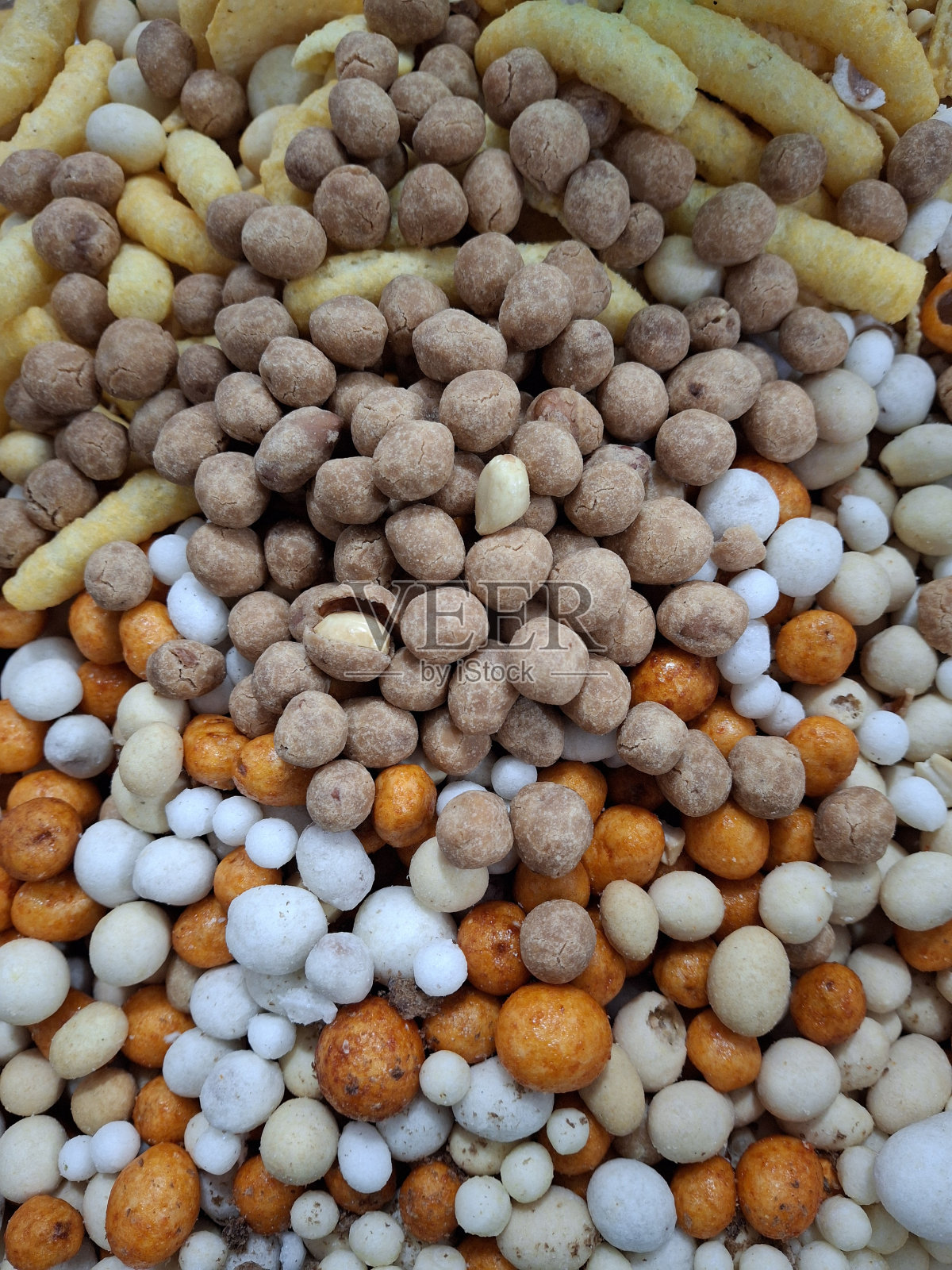 各种各样的零食混合在一起照片摄影图片