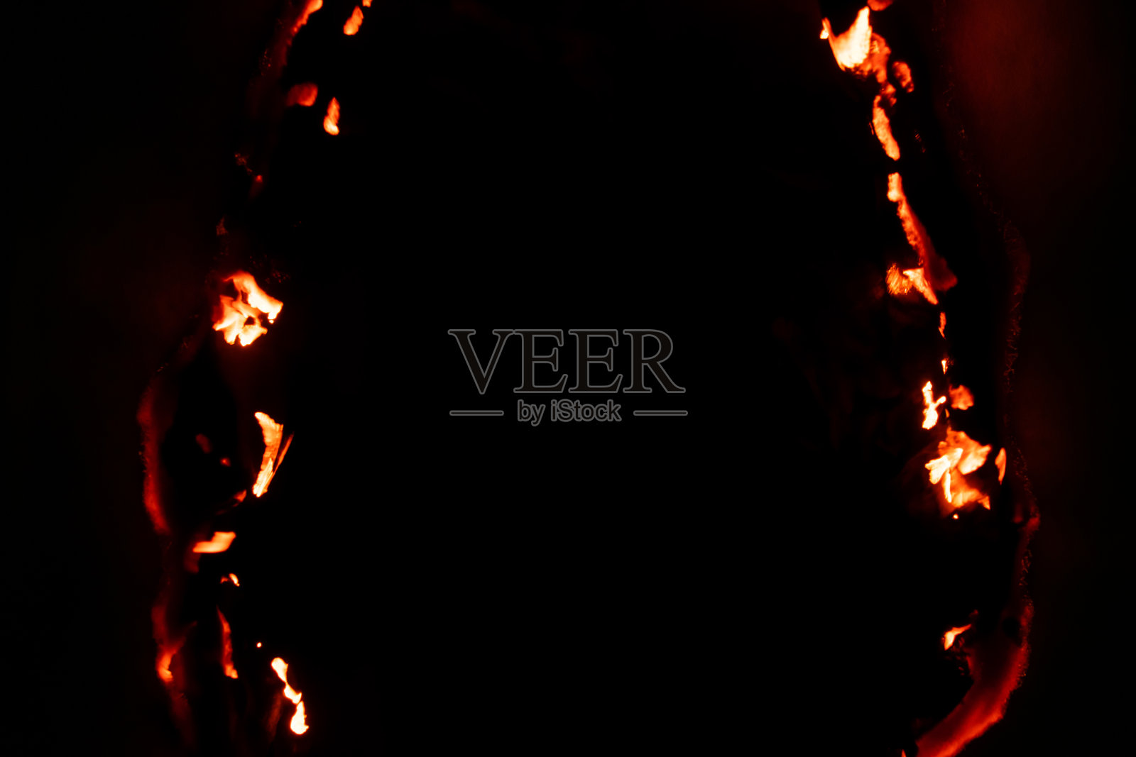 燃烧的纸,发光的纸边照片摄影图片