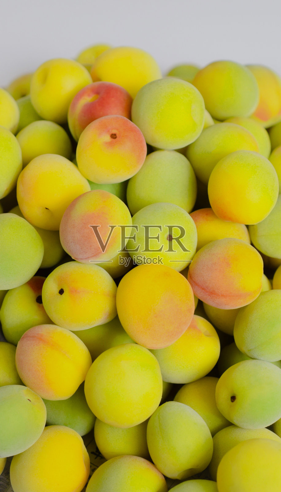 盒子里新鲜梅子:日式食物照片摄影图片