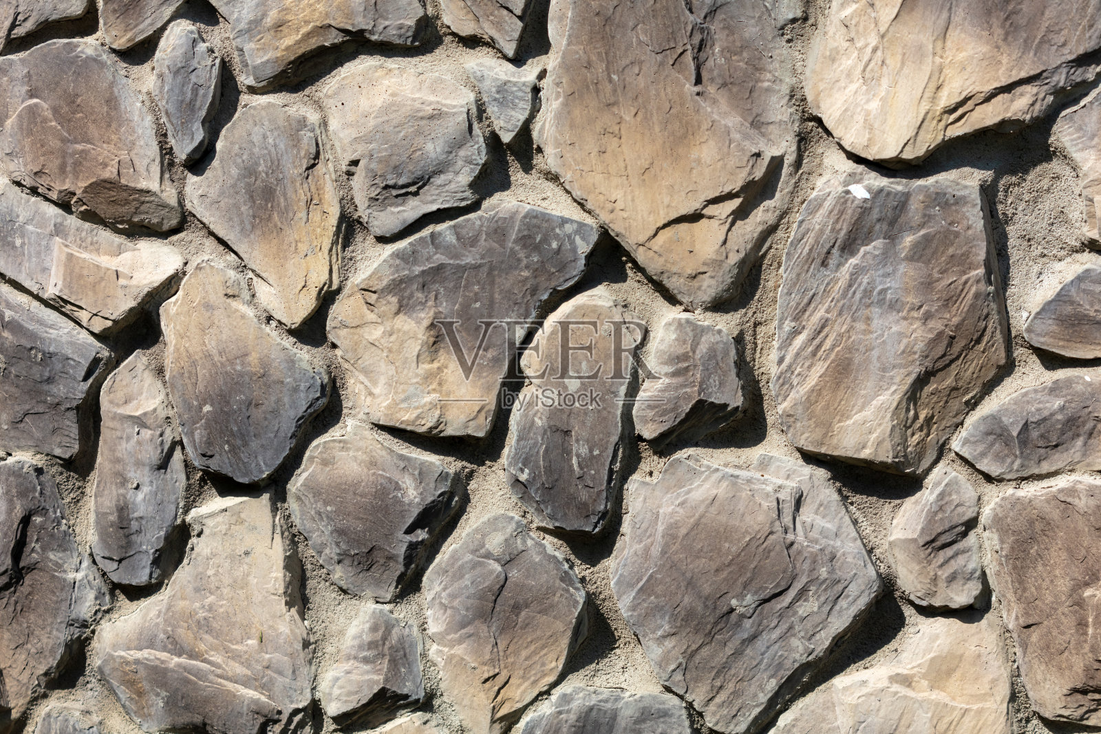 以石砖为抽象背景。纹理照片摄影图片