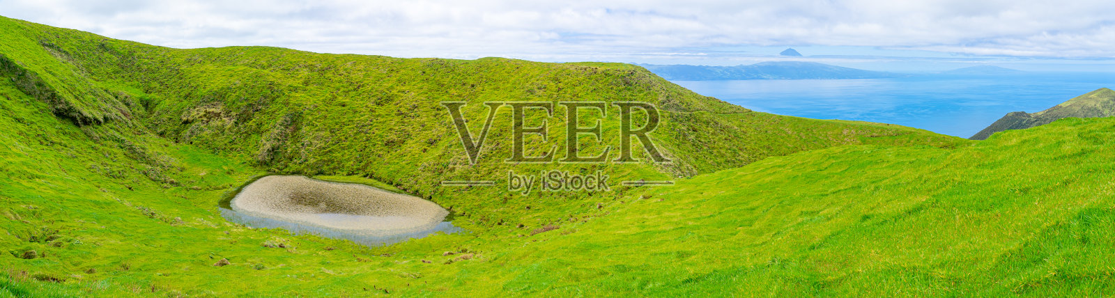 山顶在希望峰的顶端,俯瞰着皮科岛的山。乔治岛-亚速尔群岛照片摄影图片