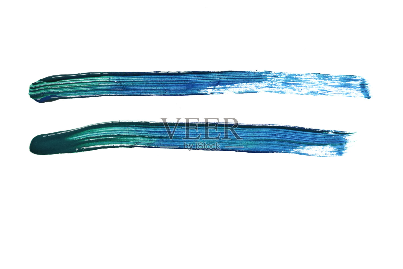 两条蓝绿漆用刷子涂上。照片摄影图片