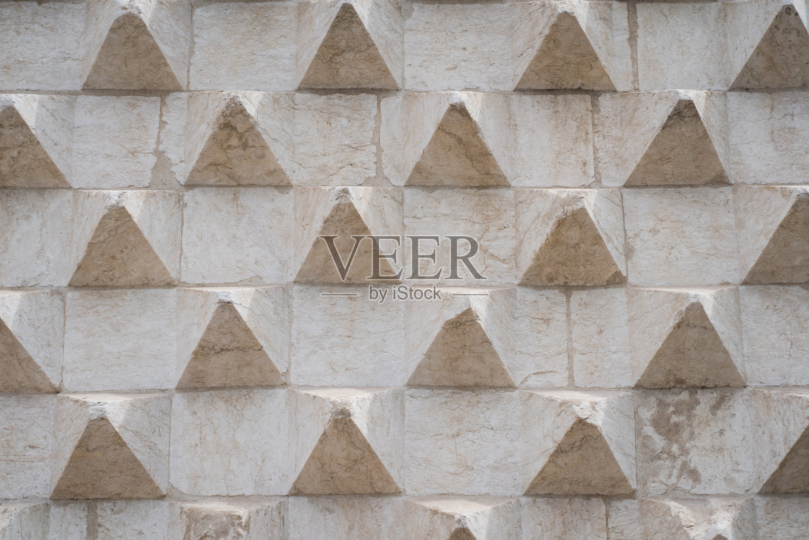 照片背景纹理,有趣的混凝土建筑立面与凸起。照片摄影图片