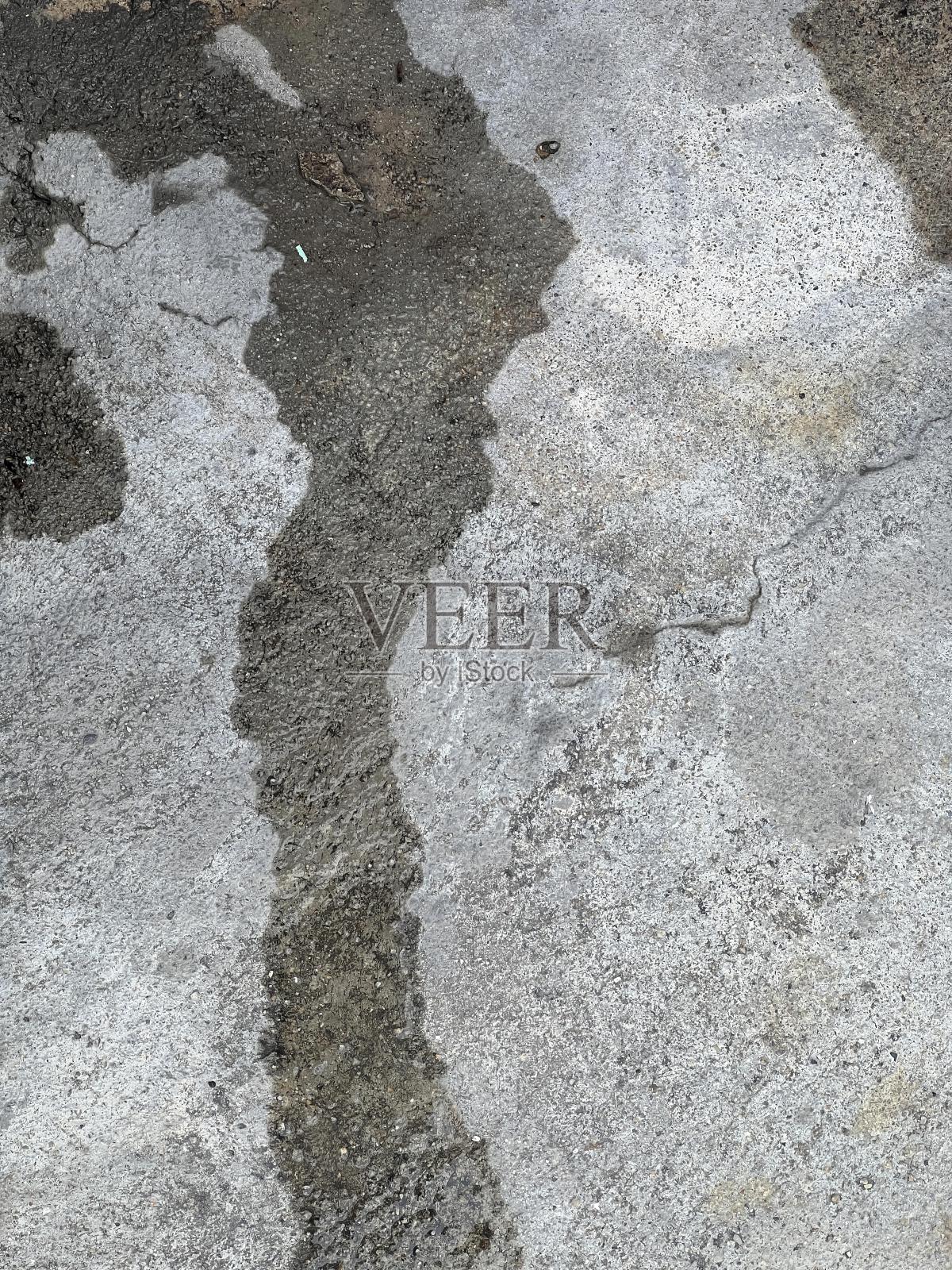 人行道上的一个消防栓的影子的照片。照片摄影图片