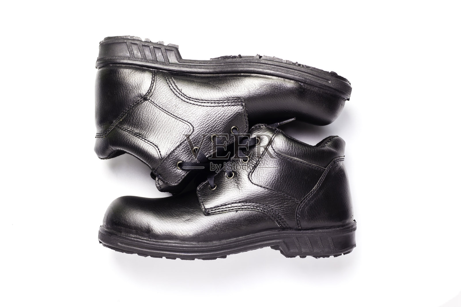 白色背景的安全鞋。照片摄影图片