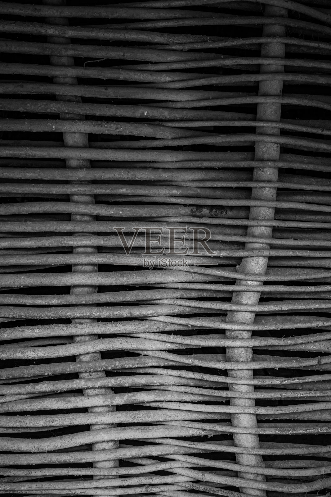 老房子的墙是用树枝做成的照片摄影图片