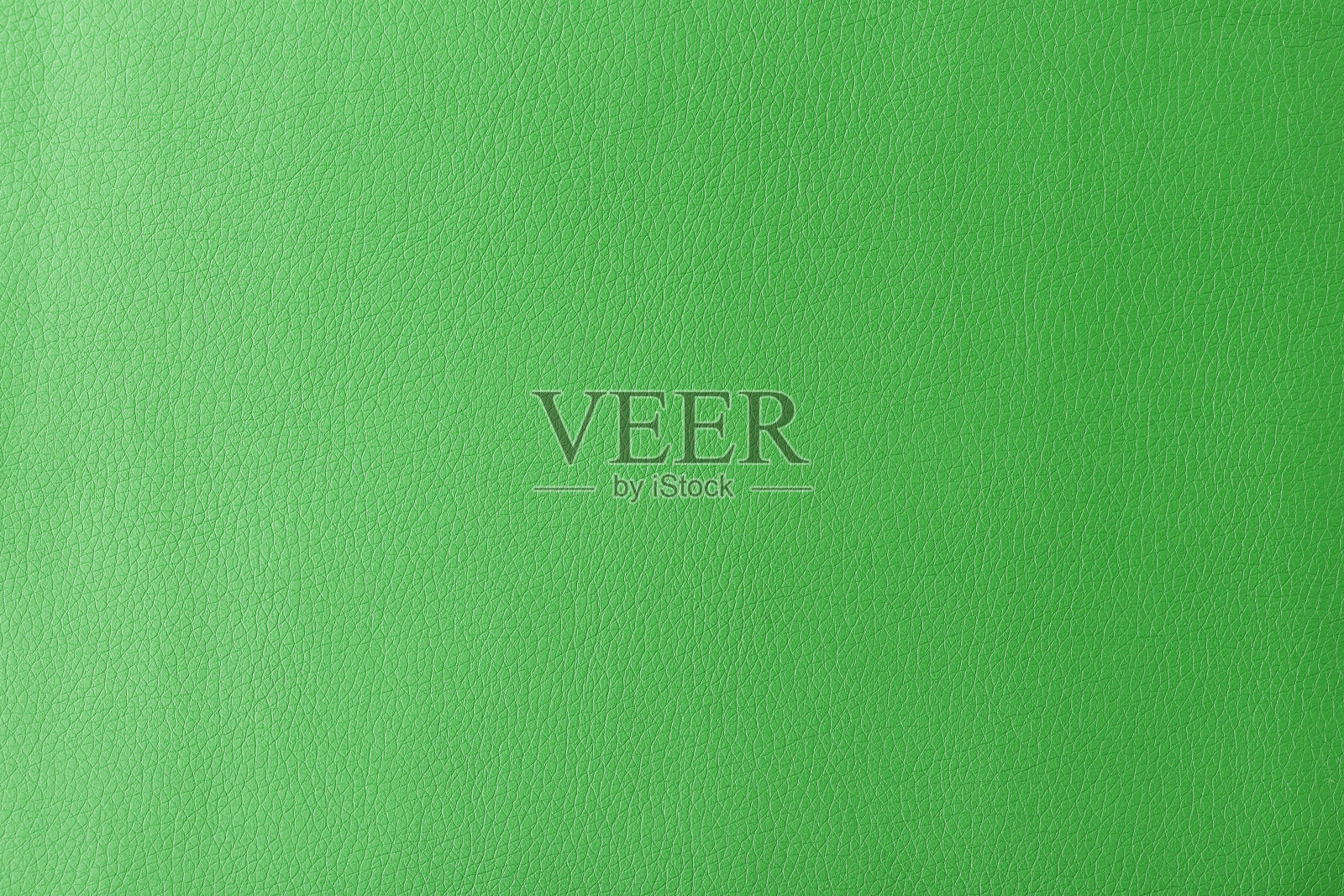 质地为真皮,底色为人造革绿色照片摄影图片