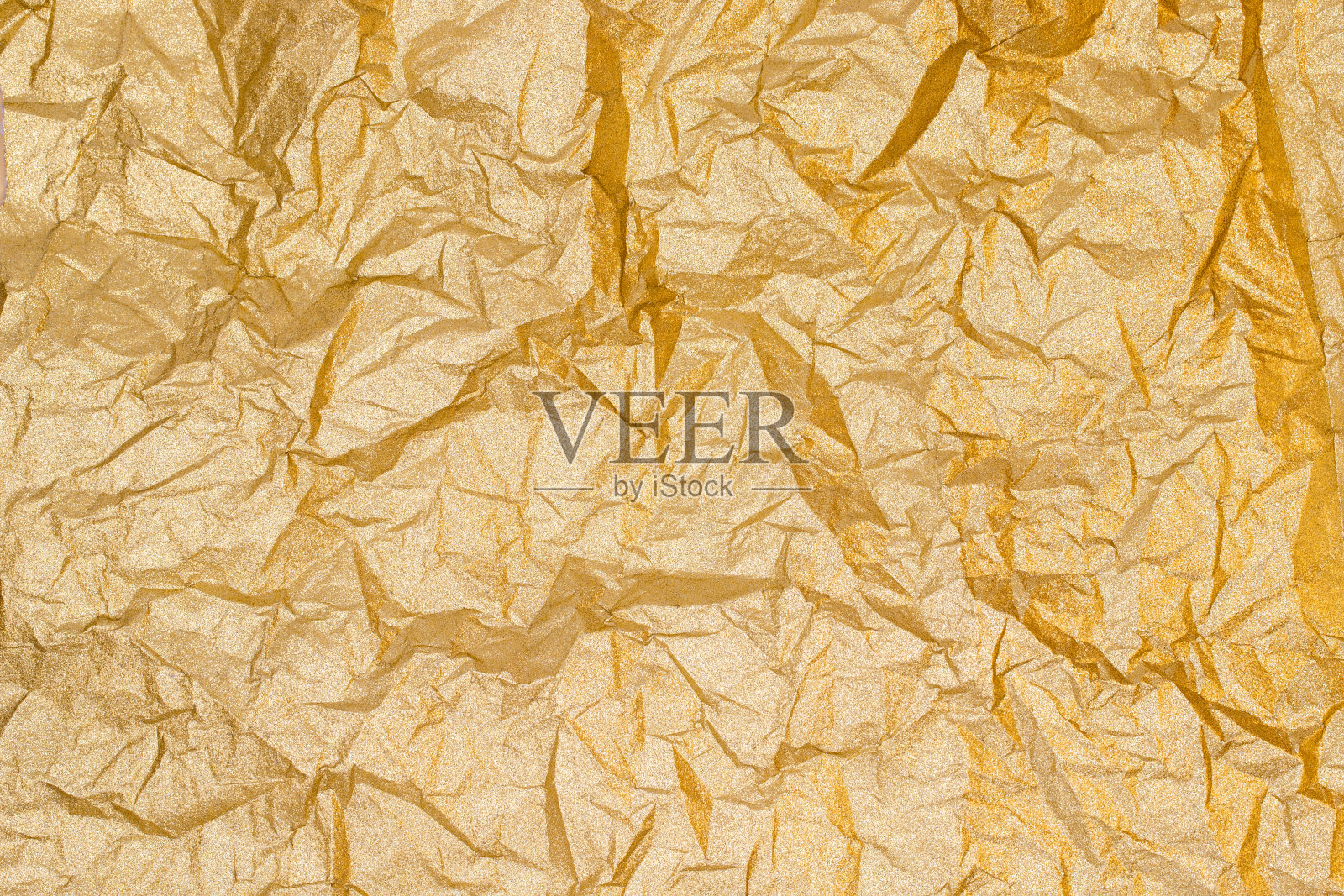闪闪发光的金色背景,皱巴巴的叶子有光泽的纹理照片摄影图片