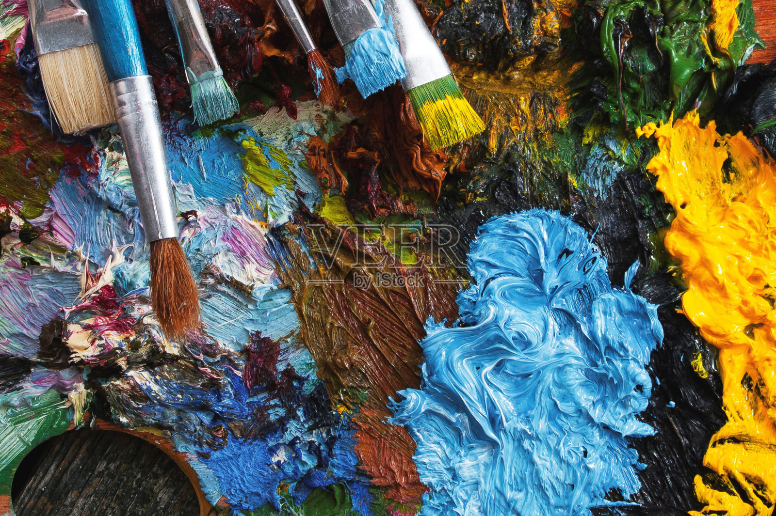 抽象调色板与画笔硬化水粉。照片摄影图片