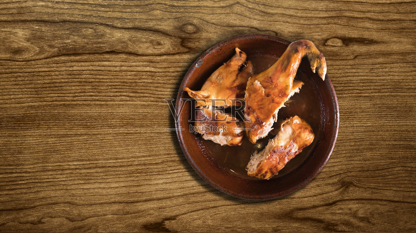 Cochinillo Segoviano烤乳猪照片摄影图片